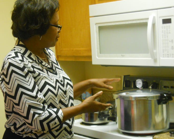 Marjorie Moore, Bay County Extension director and Family and Consumer Sciences agent at UF/IFAS Extension, prefers a dial gauge pressure canner.