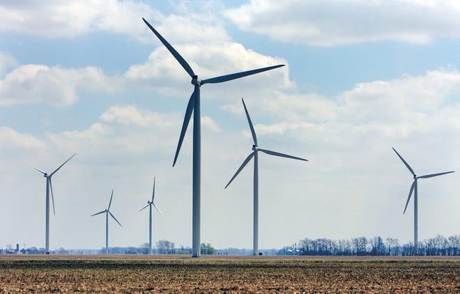 FILE -- Illinois is among the leaders nationally in wind energy. But Peoria County officials say they haven’t been approached by wind companies to set up a wind farm in Peoria County, so they don’t know why the county is an island surrounded by others with such installations. Marshall, Woodford, Tazewell and McLean counties all have wind farms. (AP Photo/Al Goldis, File)
