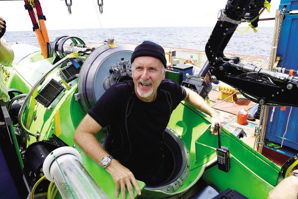 This 2012 image released by National Geographic shows filmmaker James Cameron emerging from the Deepsea Challenger after his successful solo dive to the Mariana Trench, during the filming of "James Cameron's Deepsea Challenge 3D," a film releasing on August 8. (AP Photo/National Geographic, Mark Thiessen) ORG XMIT: NYET203