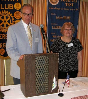 Larry Tucker installs Cindy Morganas president of the Rotary Club of Petersburg.