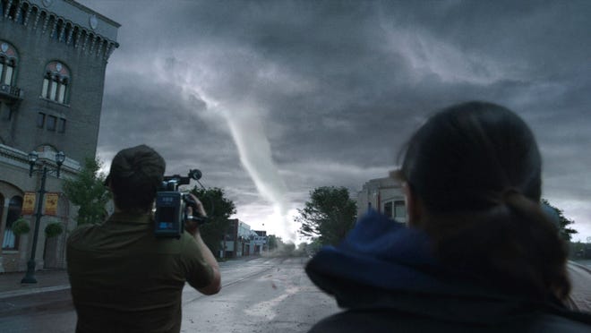 A tornado threatens an Oklahoma town during graduation day at the local high school in “Into the Storm.”