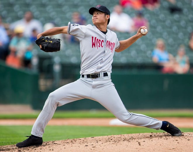 Milwaukee Brewers lefty Wei-Chung Wang, on a rehab assignment with Wisconsin, delivers in the third inning against the Chiefs in a game Peoria won, 6-4, at Dozer Park on Aug. 10, 2014.