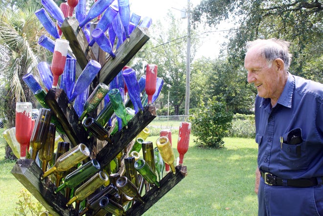 Bill Bain constructed his bottle tree almost 10 years ago using wine bottles collected from parties. “We didn’t drink all of it,” he said with a laugh.