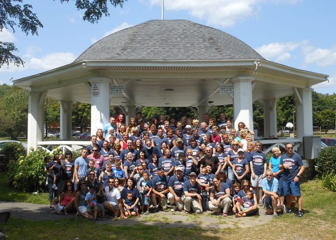 The first International Ellingsen Reunion at Hawley, August 7-10, 2014, brought together approximately 91 family members from across the United States and 24 from Norway. Most of the attendees were available for the picnic held Saturday at Bingham Park. They are shown in front of the bandstand built in 1932 and designed by the late Christoffer Ellingsen, a civil engineer, who immigrated from Norway and settled near Hawley in 1919.