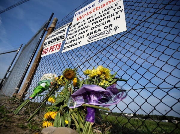 A small memorial of flowers is seen at Canandaigua Motorsports Park on Monday in Canandaigua, N.Y. (Mel Evans | Associated Press)
