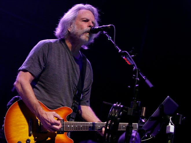 This March 16, 2014 file photo shows Grateful Dead alumni Bob Weir and his band, Ratdog, performing in Atlanta.