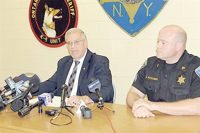Ontario County Sheriff Philip Povero (left) speaks at a news conference Sunday in Canandaigua. Povero says that investigators don't have any evidence at this point to support criminal intent in the fatal crash that killed Kevin Ward Jr.



AP Photo/Melody Burr, The Daily Messenger