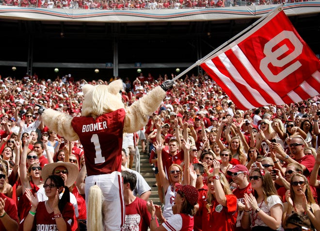 OU mascot Boomer wave a flag in front of fans during the Red River Rivalry college football game between the University of Oklahoma Sooners (OU) and the University of Texas Longhorns (UT) at the Cotton Bowl in Dallas, Saturday, Oct. 8, 2011. Oklahoma won 55-17. Photo by Bryan Terry, The Oklahoman ORG XMIT: KOD