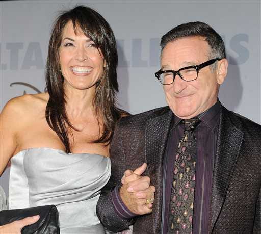 Robin Williams, right, and his wife Susan Schneider at the premiere of "Old Dogs" in Los Angeles. Schneider said Williams was in the early stages of Parkinson's disease.