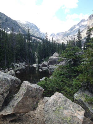Terrain near Lake Haiyaha in the Bear Lake Corridor Trails area in Rocky Mountain National Park in Colorado offers good day hikes using the town of Estes Park as a gateway. The park is launching a yearlong celebration of its centennial in September.