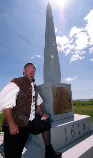 John Huff/Staff photographer

Re-enactor Paul Strand portrays Capt. John Smith during a ceremony at Rye Harbor State Park Thursday where a new 1614 monument commemorates the 400th anniversary of Smith's mapping expedition of New England.