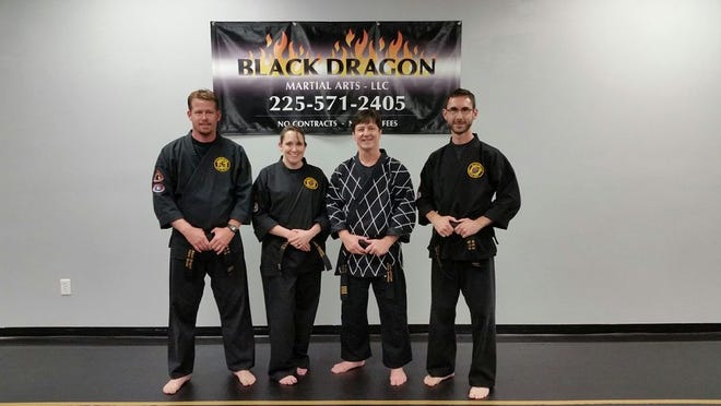 Marc Sholar stands on the far left with Barrett Berard on the far right. Master Ken Ducote and wife Kristine stand in the middle.