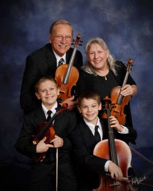 The Sandquist family, clockwise from upper left, Art, Carolyn, Patrick and Peter, will perform a free recital at 2 p.m. Saturday at First Lutheran Church, 1234 S.W. Fairlawn Road. Pianist Kristi Baker, cellist Dawn Blair and violinist Amanda Wall will assist.