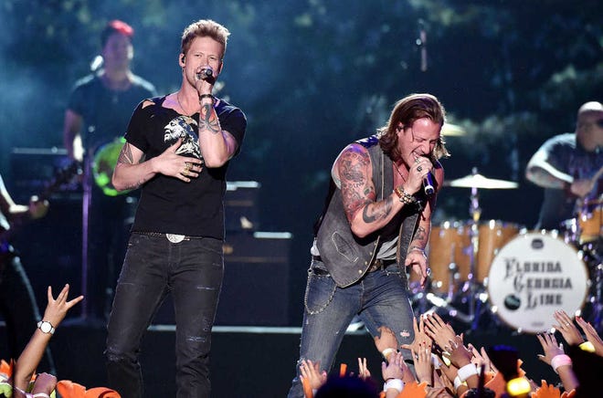 Florida Georgia Line, the country duo of Brian Kelley, left, and Tyler Hubbard, shown performing July 17 at the Kids' Choice Sports Awards in Los Angeles, will be the Friday night headliner at 20th annual Kicker Country Stampede, which will be June 25-28, 2015, at Tuttle Creek State Park north of Manhattan.