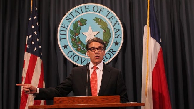 Governor Rick Perry speaking at the Capitol on August 16, 2014.