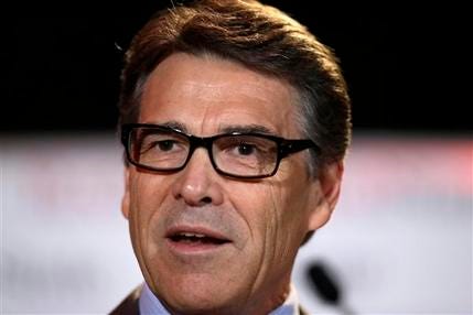 In this Friday, Aug. 8, 2014, file photo, Texas Gov. Rick Perry delivers a speech to nearly 300 in attendance at the 2014 RedState Gathering, in Fort Worth, Texas. Perry was indicted on Friday, Aug. 15, 2014, for abuse of power after carrying out a threat to veto funding for state public corruption prosecutors. (AP Photo/Tony Gutierrez, File)