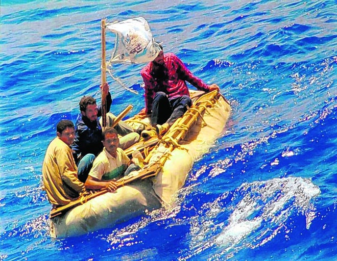 In this Aug. 26, 1994, file photo, Cuban refugees float in heavy seas 60 
miles south of Key West. In the 20 years since Fidel Castro set off a 
high-seas humanitarian crisis by encouraging an exodus of 35,000 islanders, 
more than 26,000 other Cubans have risked their lives crossing the Florida 
Straits. Already this year, close to 3,000 have been picked up by U.S. 
authorities, on pace to double last year's total.AP ARCHIVE / AUGUST 1994