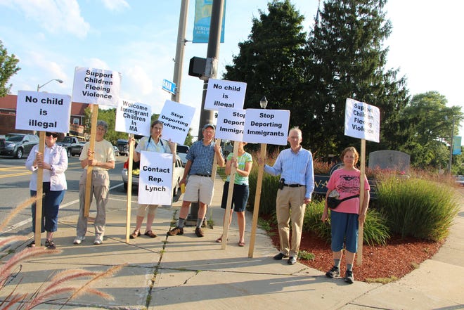 Walpole Peace and Justice Group held a vigil last Wednesday for the unaccompanied child refugees. Courtesy photo