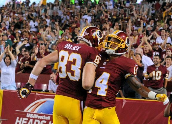 AP PHOTO
Washington Redskins tight end Ted Bolser (83) and Washington wide receiver Ryan Grant celebrate Grant's touchdown during the second half of a preseason game against the Cleveland Browns on Monday night in Landover, Md.