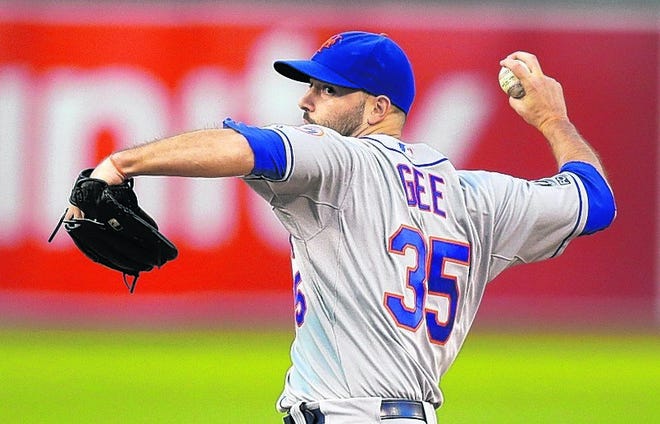 Mets' Dillon Gee pitches against the Athletics in the first inning.