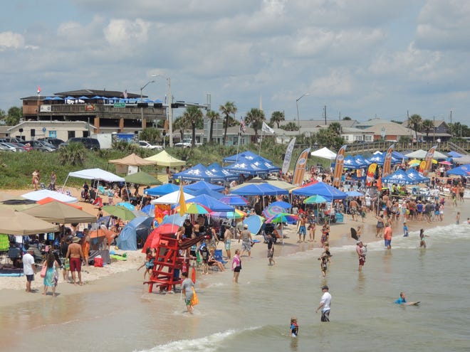 Hundreds of families turned out for the fifth annual Surfers for Autism event in Flagler Beach over the weekend.