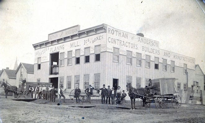 This early 1900s photo shows the carpenters and carriages of Geo. J. Rothan Co. that created customized bars and liquor cabinets for Peoria's distilleries and whiskey barons. The company, known today at Rothan Millwork Co., shifted its focus to restaurant fixtures at the onset of Prohibition. Today the business does primarily commercial work.