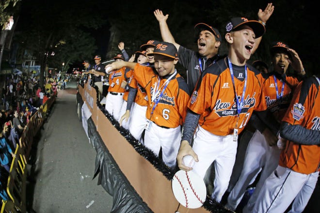 Members of the Cumberland American team are introduced during a parade before the Little League World Series on Aug. 13 in South Williamsport, Pa. Cumberland was eliminated from the double-elimination tournament on Monday after an 8-7 loss to Illinois.