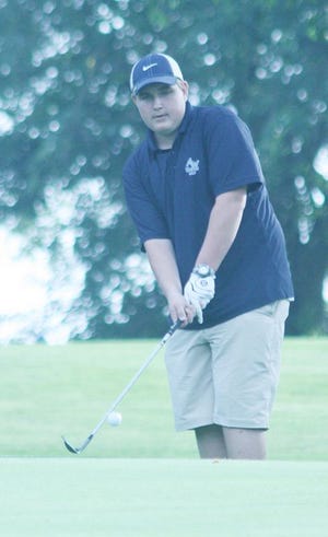 Annawan-Wethersfield’s Ryan Smith chips onto the first green in Thursday night’s triangular at Kewanee Dunes.