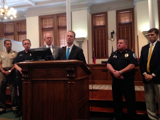 New Hanover County Sheriff Ed McMahon, Wilmington Police Department Chief Ralph Evangelous, Chief District Court Judge Jay Corpening, District Attorney Ben David, Wrightsville Beach Chief Dan House and New Hanover County Schools Superintendent Tim Markley discuss a couple initiatives Thursday at the historic New Hanover County courthouse.