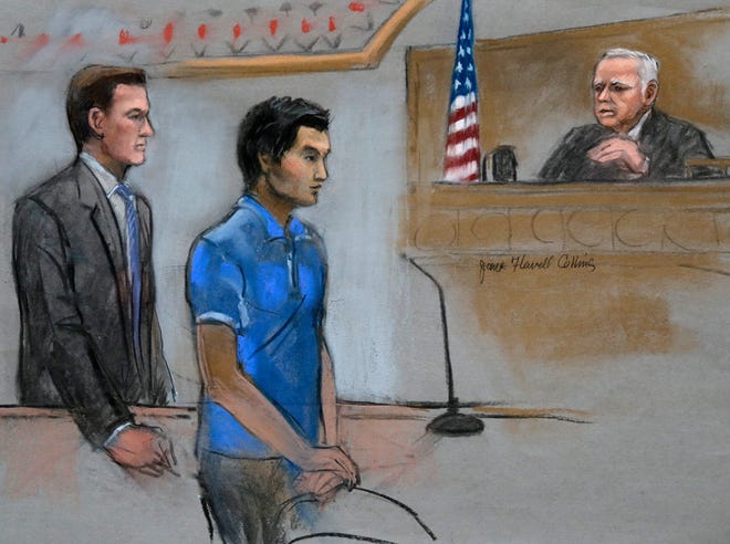 In this courtroom sketch, defendant Dias Kadyrbayev, center, a college friend of Boston Marathon bombing suspect Dzhokhar Tsarnaev, is depicted Thursday, Aug. 21, 2014 in federal court in Boston during a hearing where he pleaded guilty before Judge Douglas P. Woodlock, right, to impeding the investigation into the deadly attack. At left is his defense attorney Robert Stahl. Kadyrbayev, of Kazakhstan, was accused of removing a backpack containing emptied-out fireworks from Tsarnaev's dorm room after realizing he was suspected of carrying out the 2013 attack with his brother, Tamerlan Tsarnaev.