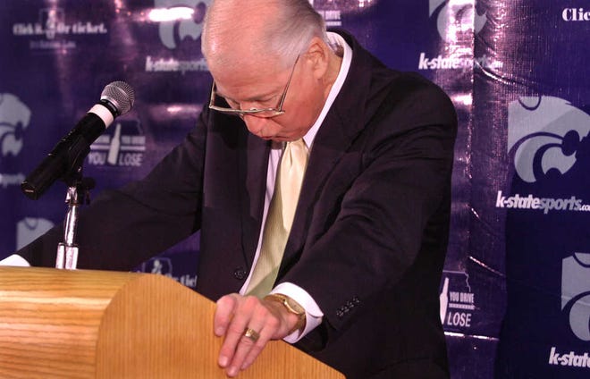 Kansas State coach Bill Snyder takes a moment during a news conference announcing his retirement from coaching the Kansas State Wildcat football team at the end of the 2005 season.