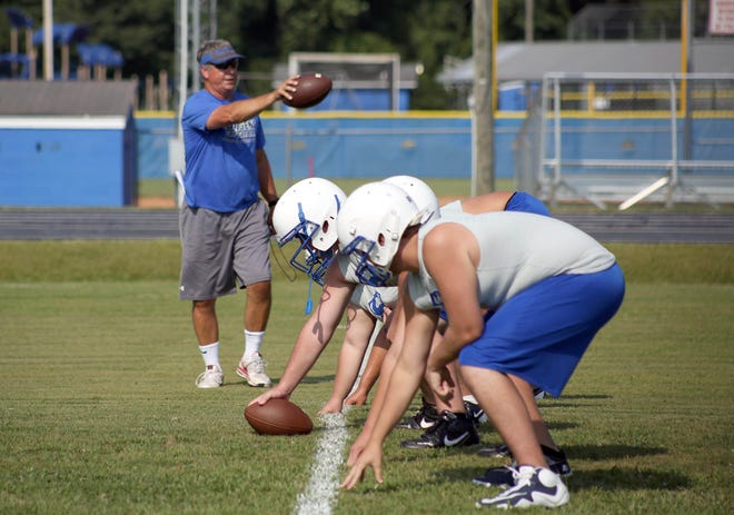 Sulligent High School's offensive line works on snaps during camp on Tuesday, August 5, 2014. The Tuscaloosa News | Kirsten Fiscus