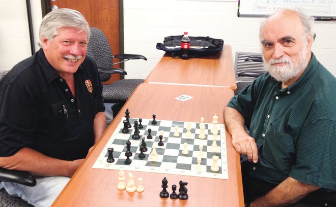 In photo, long-time Wachusett Chess Club members (left) Ken Gurge of Leominster and George Mirijanian.
