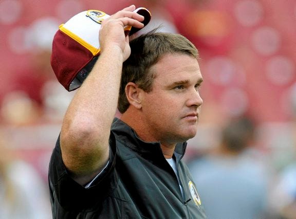AP PHOTO
Washington Redskins coach Jay Gruden pauses on the field before a preseason game against the Cleveland Browns on Aug. 18 in Landover, Md.