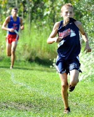Indian Valley’s Cody Booth runs toward the finish of the Claymont Early Bird Invitational Cross Crountry Meet on Saturday.