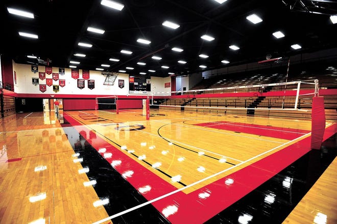 The renovation of the New Philadelphia High School gymnasium, featuring a new scoreboard and refurbished floor, is complete with a volleyball match officially opening the facility last week.