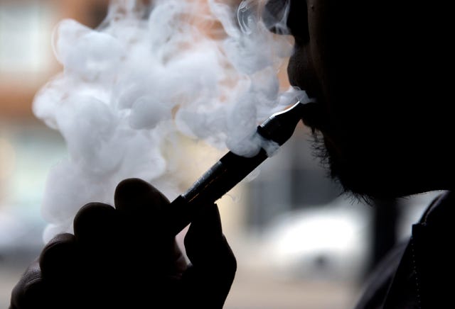 THE ASSOCIATED PRESS / In this April 23, 2014, file photo, an electronic cigarette is demonstrated in Chicago. In a surprising new policy statement, the American Heart Association backs electronic cigarettes as a last resort to help smokers quit. (AP Photo/Nam Y. Huh, File)