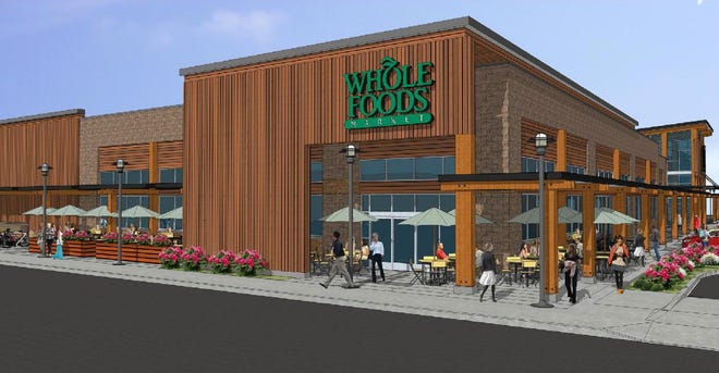 This architectural endering of proposed Whole Foods store in Eugene shows the grocery's southeast corner. (Donahou Design Group)