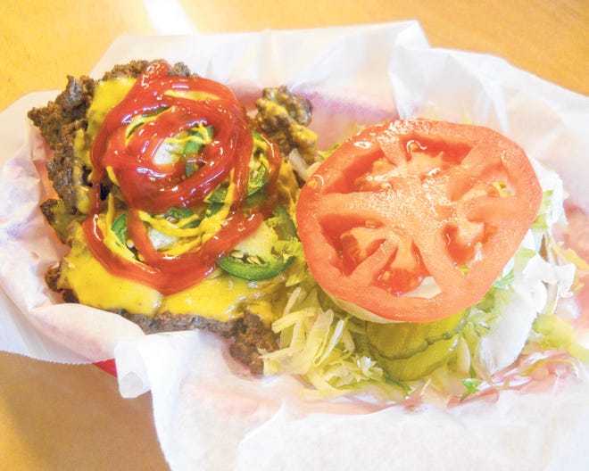 The Front Porch on Thomas Drive in Panama City Beach serves an Original Cheeseburger with two patties cooked on a cast-iron griddle.