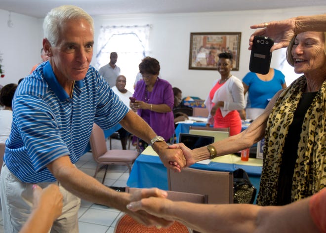 Former Florida Republican Gov. Charlie Crist makes a campaign stop in Boynton Beach, Tuesday before the results were in that showed him the winner of the Democratic primary.