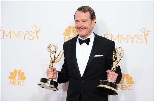Bryan Cranston, winner of the award for outstanding lead actor in a drama series for his work in “Breaking Bad," poses in the press room at the 66th Annual Primetime Emmy Awards at the Nokia Theatre L.A. Live on Monday, Aug. 25, 2014, in Los Angeles. (Photo by Jordan Strauss/Invision/AP)