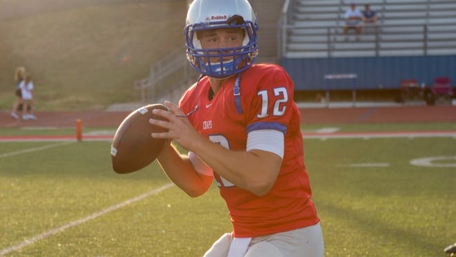 Starting QB Sam Ehlinger warms up before the scrimmage against Cedar Park at Westlake on Friday night, August 22nd, 2014.