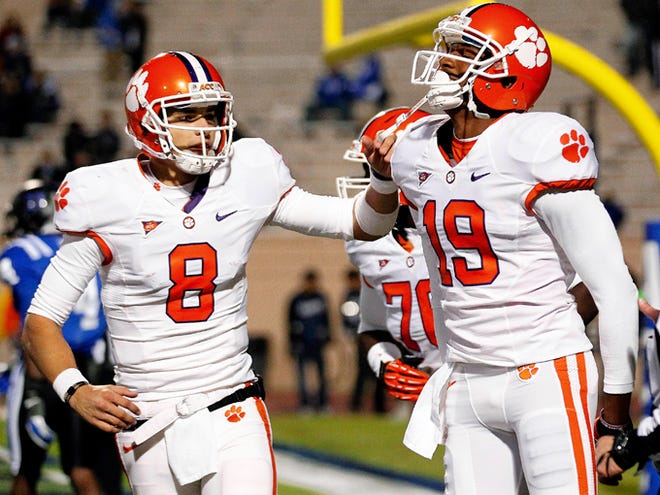 Clemson QB Cole Stoudt (8) and Charone Peake celebrate a touchdown in a 2012 game at Duke. Stoudt is the starting quarterback now, while Peake, the wide receiver from Dorman, is hoping to contribute after an injury-shortened 2013 season.