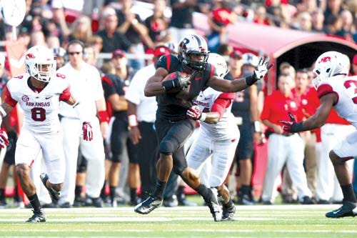Photo courtesy of Rutgers Athletic Communications — Junior wide receiver Leonte Carroo, center, is one of many offensive weapons for the Scarlet Knights this season. Carroo victimized Fresno State in last year’s season opener with three touchdowns.