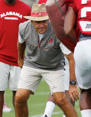 Alabama head coach Nick Saban gives feedback during a morning practice of fall camp 2014 at Thomas-Drew practice fields in Tuscaloosa, Ala. on Monday Aug. 11, 2014.