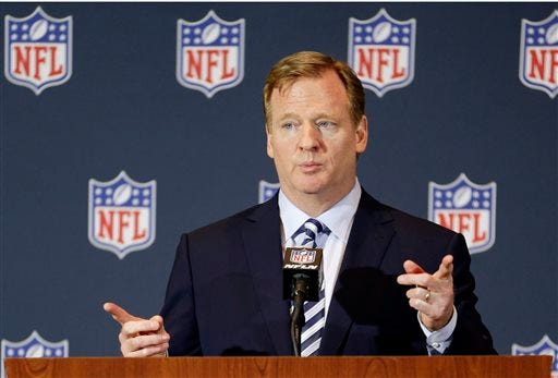 FILE - In this March 25, 2014, file photo, NFL Commissioner Roger Goodell answers questions during a news conference at the NFL football annual meeting in Orlando, Fla. Players will be subject to a six-week suspension for a first domestic violence offense and banishment from the league for a second under a new policy outlined by Commissioner Roger Goodell in a letter and memo sent to all 32 teams owners Thursday, Aug. 28, 2014, and obtained by The Associated Press.