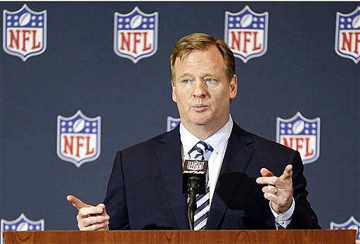 FILE - In this March 25, 2014, file photo, NFL Commissioner Roger Goodell answers questions during a news conference at the NFL football annual meeting in Orlando, Fla. Players will be subject to a six-week suspension for a first domestic violence offense and banishment from the league for a second under a new policy outlined by Commissioner Roger Goodell in a letter and memo sent to all 32 teams owners Thursday, Aug. 28, 2014, and obtained by The Associated Press. (AP Photo/John Raoux, File)