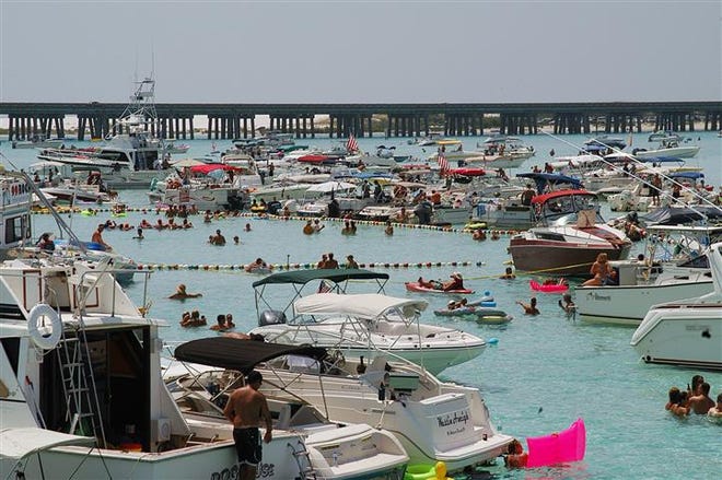 Crowds gather at Crab Island each weekend for a little fun in the sun, whether it’s for the kids or adults