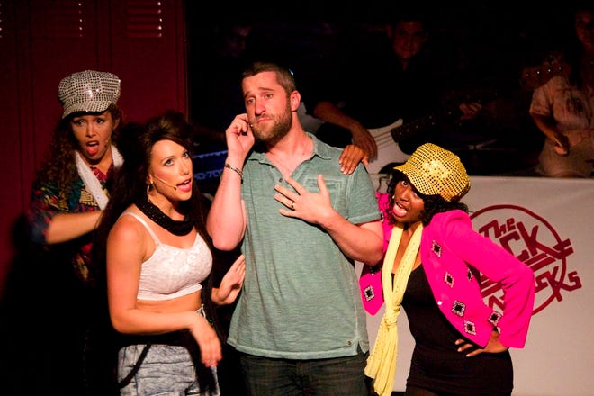 Dustin Diamond, center, stars in the off-Broadway show “Bayside! The Musical!” with Adriana Spencer as Jessie Spano, Katie Mebane as Kelly Kapowski and Shamira Clark as Lisa Turtle, at Theatre 80 in New York City. Diamond, who played Screech on TV for a decade, is spending the next few months in the “Saved by the Bell” parody.
