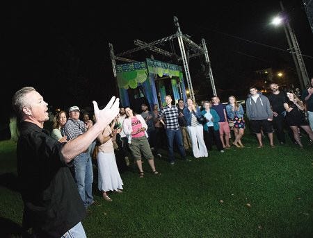Trevor Bartlett, far left, a "Keep Portsmouth Loud" Facebook page administrator, expresses his frustration concerning the cancellation of two movies scheduled to take place in Prescott Park on Thursday evening. About 100 people rallied in the park Thursday.